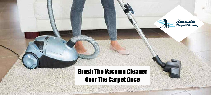 Brush Vacuum Cleaner over the Carpet